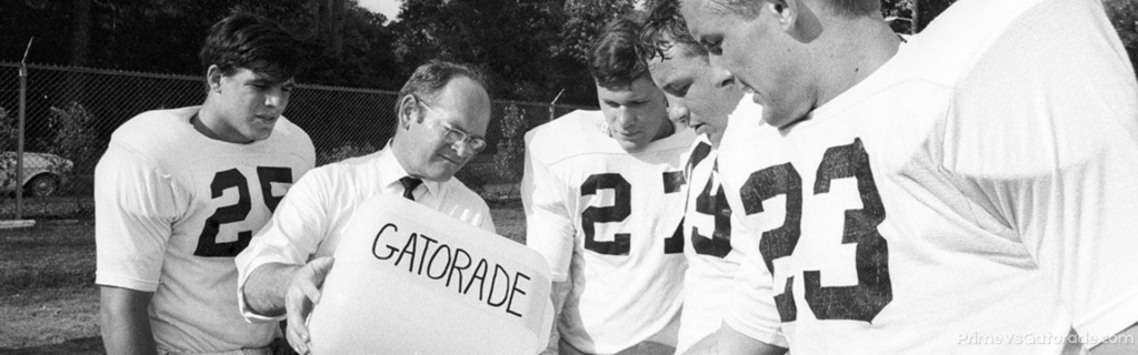Dr. Robert Cade is pouring Gatorade to NFL athletes.
